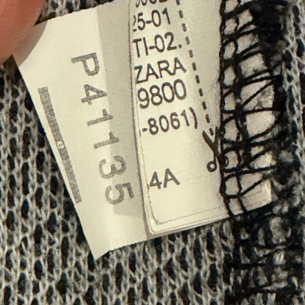 Zara women’s black tweed and faux leather cardigan